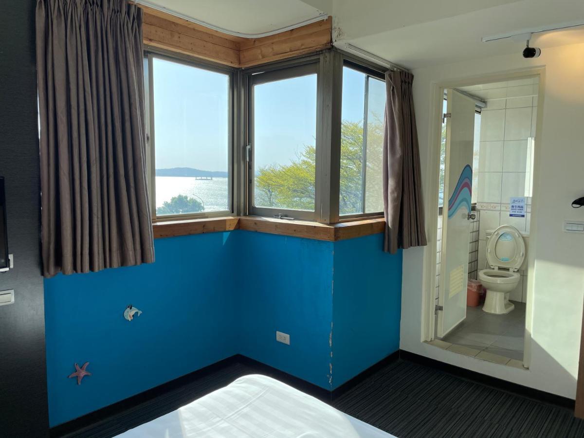 Breeze And Waves Hostel Jinning Exterior foto
